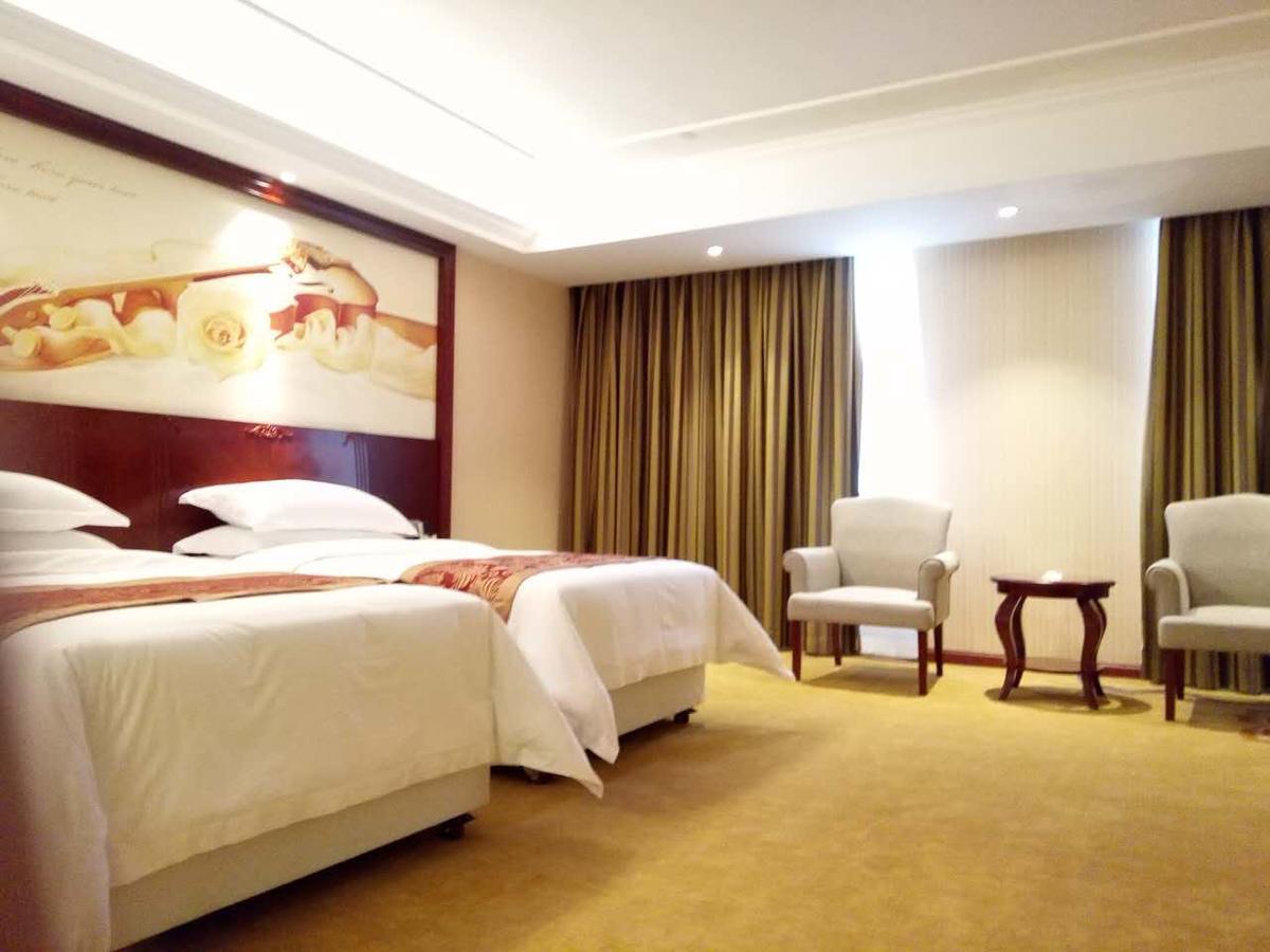 Vienna Hotel Zhongshan Guzhen Town Center Exterior photo