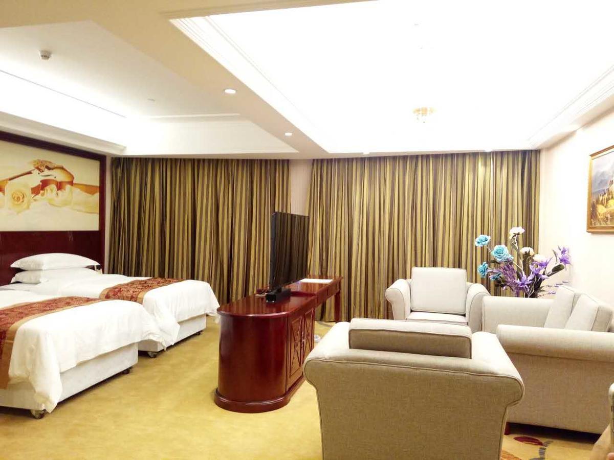 Vienna Hotel Zhongshan Guzhen Town Center Exterior photo