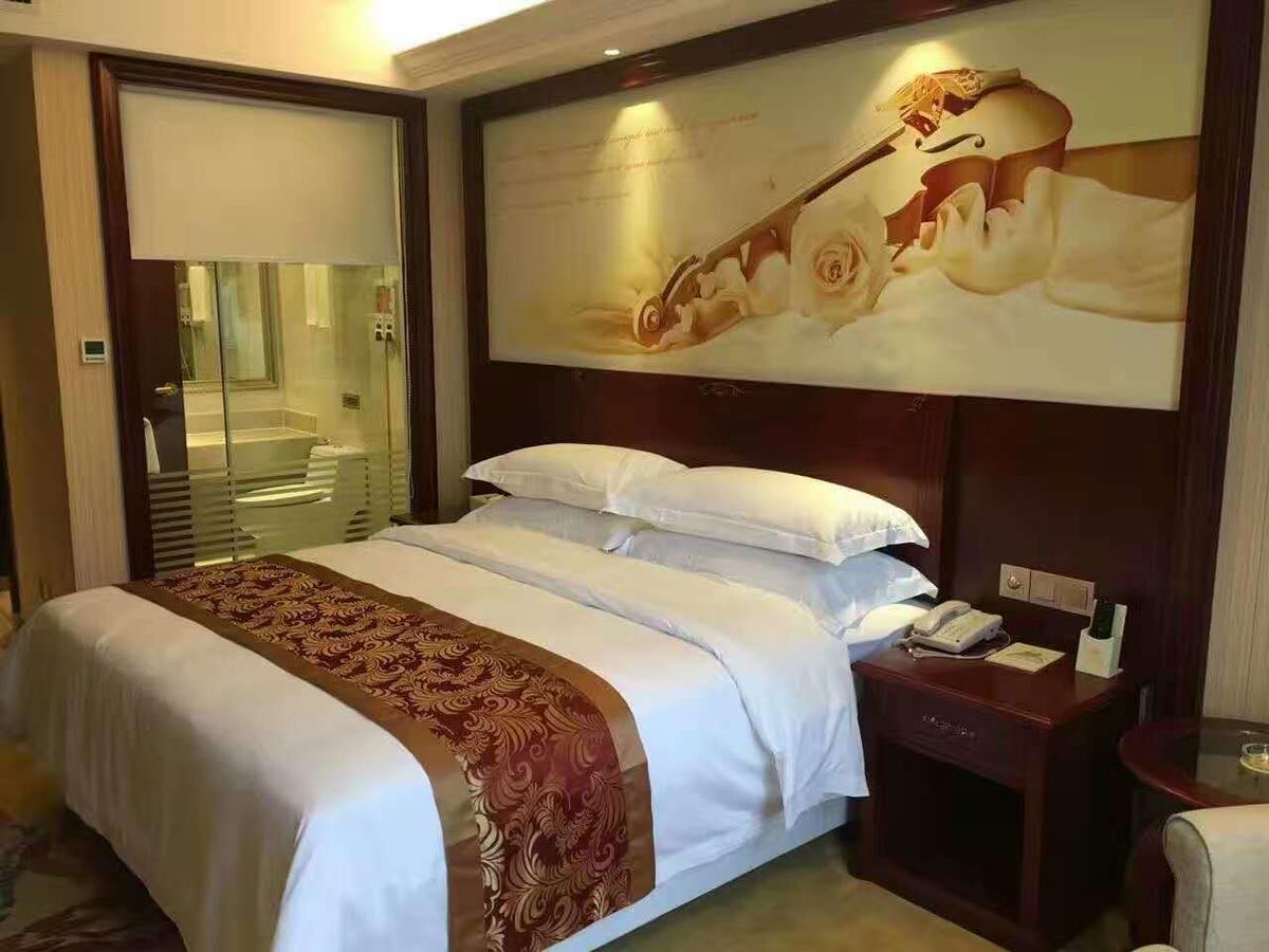 Vienna Hotel Zhongshan Guzhen Town Center Exterior photo