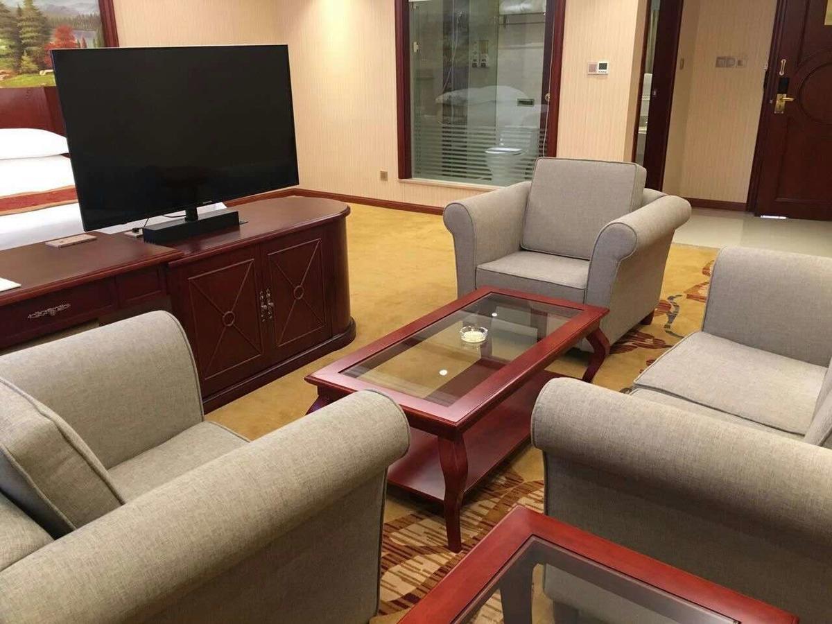 Vienna Hotel Zhongshan Guzhen Town Center Exterior photo